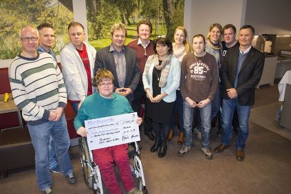 Spendenübergabe von Total und FanTastick an die Rostocker DRK Werkstätten gGmbH